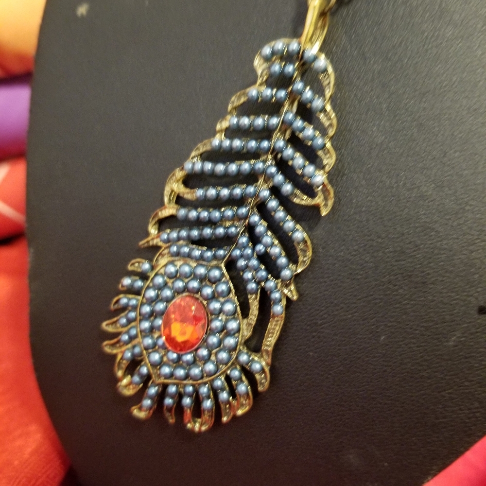 Feather Necklace.